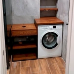 A cabinet under the sink with a niche for a washing machine. Karagach