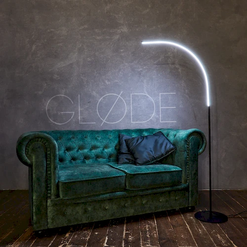 Использование дугообразного торшера NellOsmo в кабинете для чтения и создания расслабляющей атмосферы