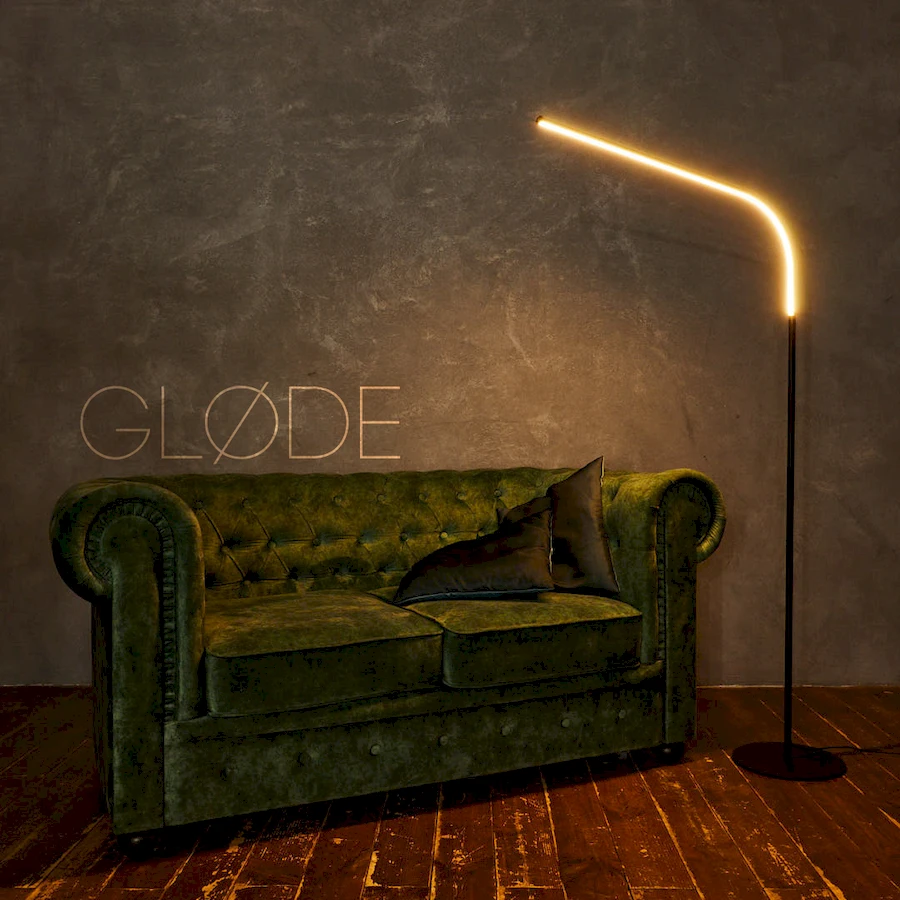 Торшер JoyLumen рядом с диваном Честерфилд в кабинете для создания уютного освещения