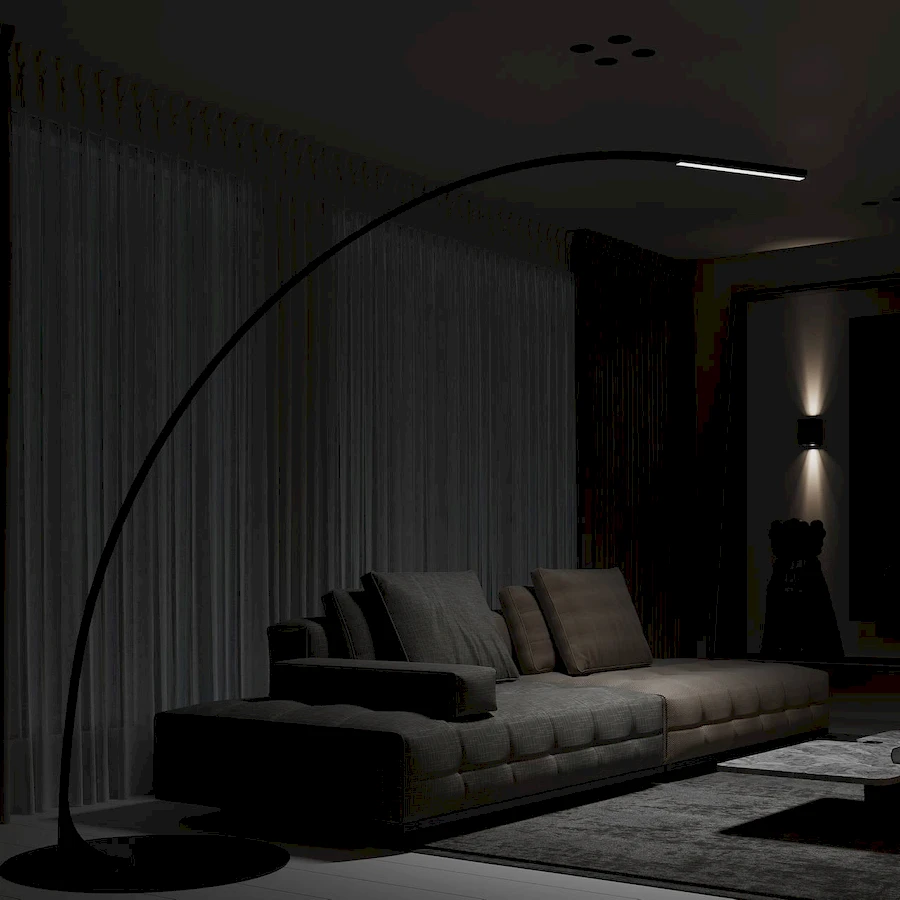 Торшер с арочной конструкцией ArcLarge, размещенный рядом с диваном-кроватью для комфортного чтения и расслабляющей атмосферы